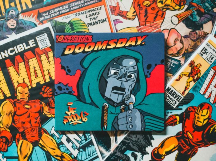 Assortment of classic hero comic book covers featuring Doctor Doom and Iron Man