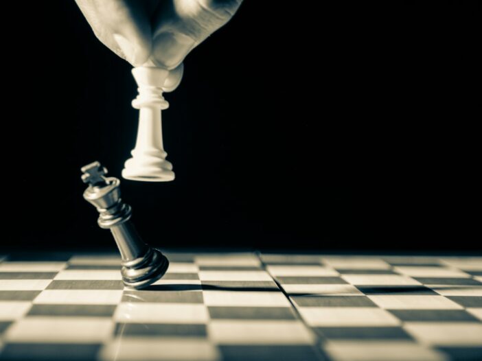 Chess pieces illustrate the know your enemy and know yourself meaning through strategy, awareness, and calculated decision-making.