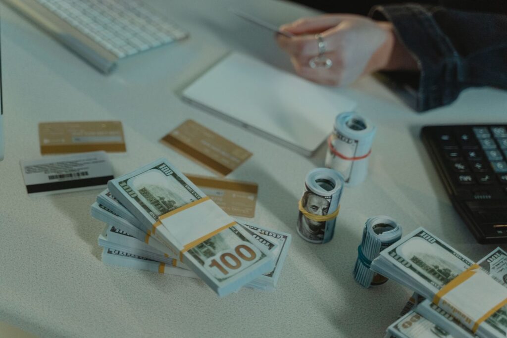 Stacks of cash and credit cards representing the Godfather Corleone family business