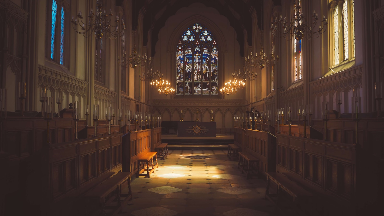 oody cathedral interior with stained glass for a God is dead Nietzsche article