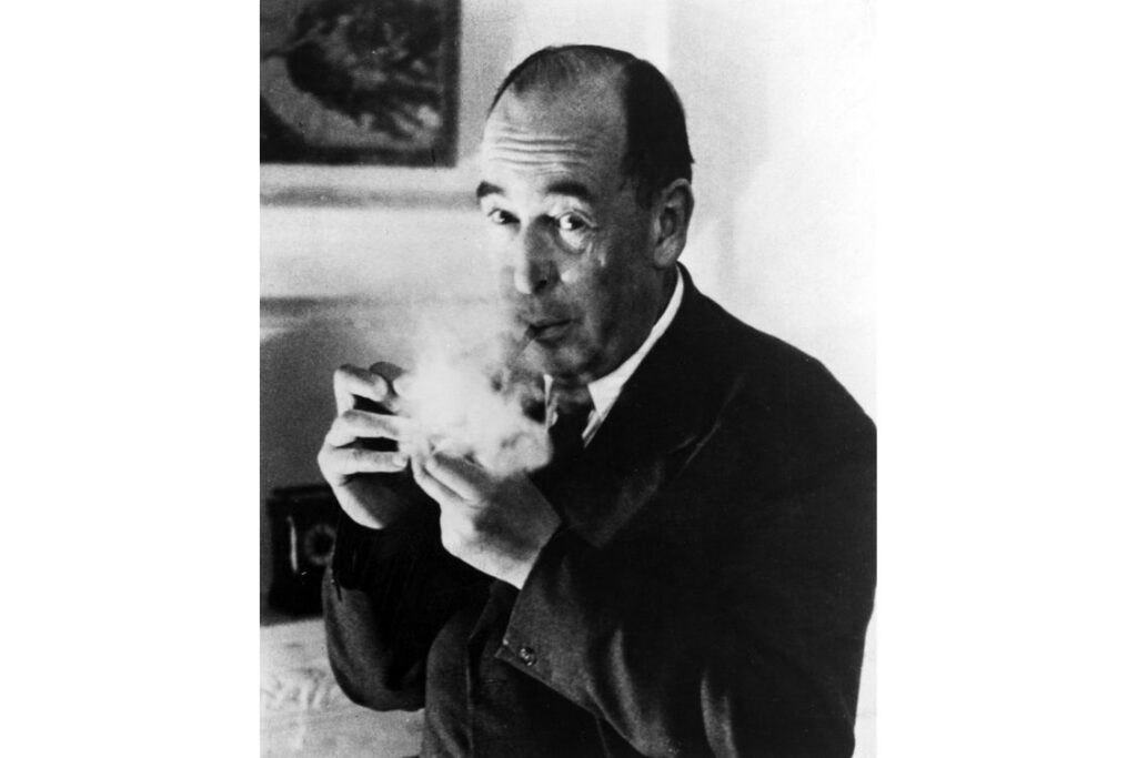 Black-and-white portrait of C.S. Lewis smoking, circa 1957