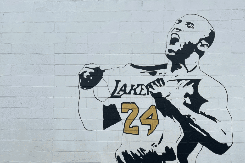 Black-and-white Kobe Bryant mural wearing a Lakers number 24 jersey.