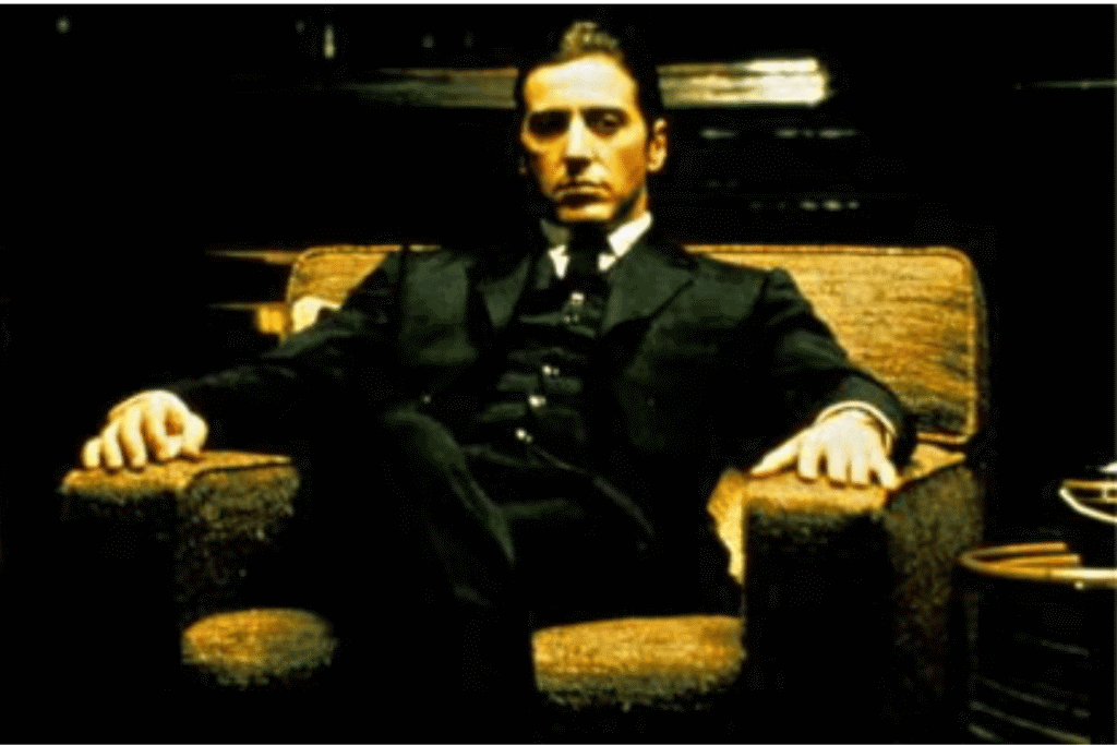 Al Pacino as Michael Corleone seated in The Godfather Part II